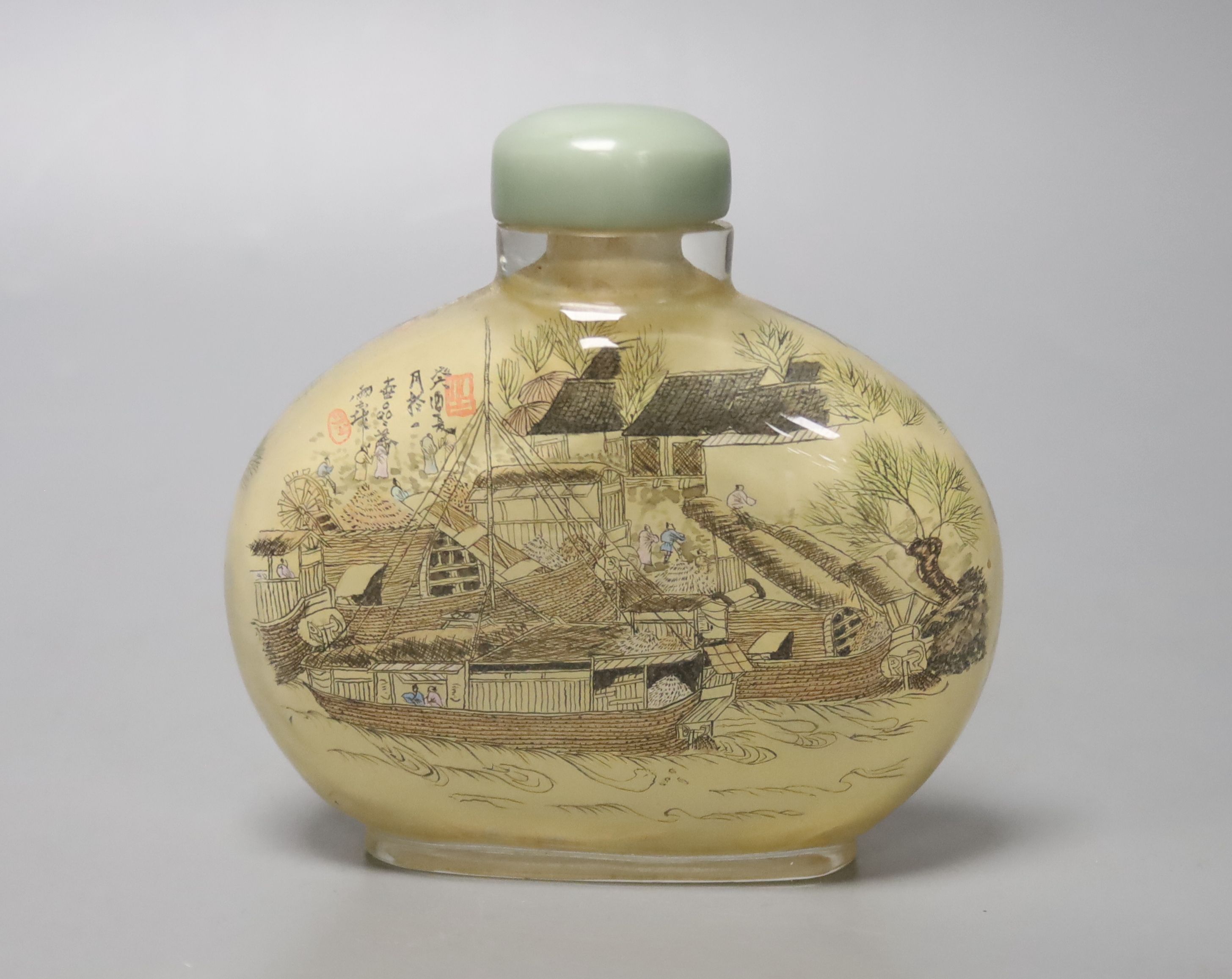 A Chinese inside-painted glass snuff bottle and cover, 10cm high